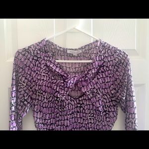 Body hugging 3/4 sleeve knit top